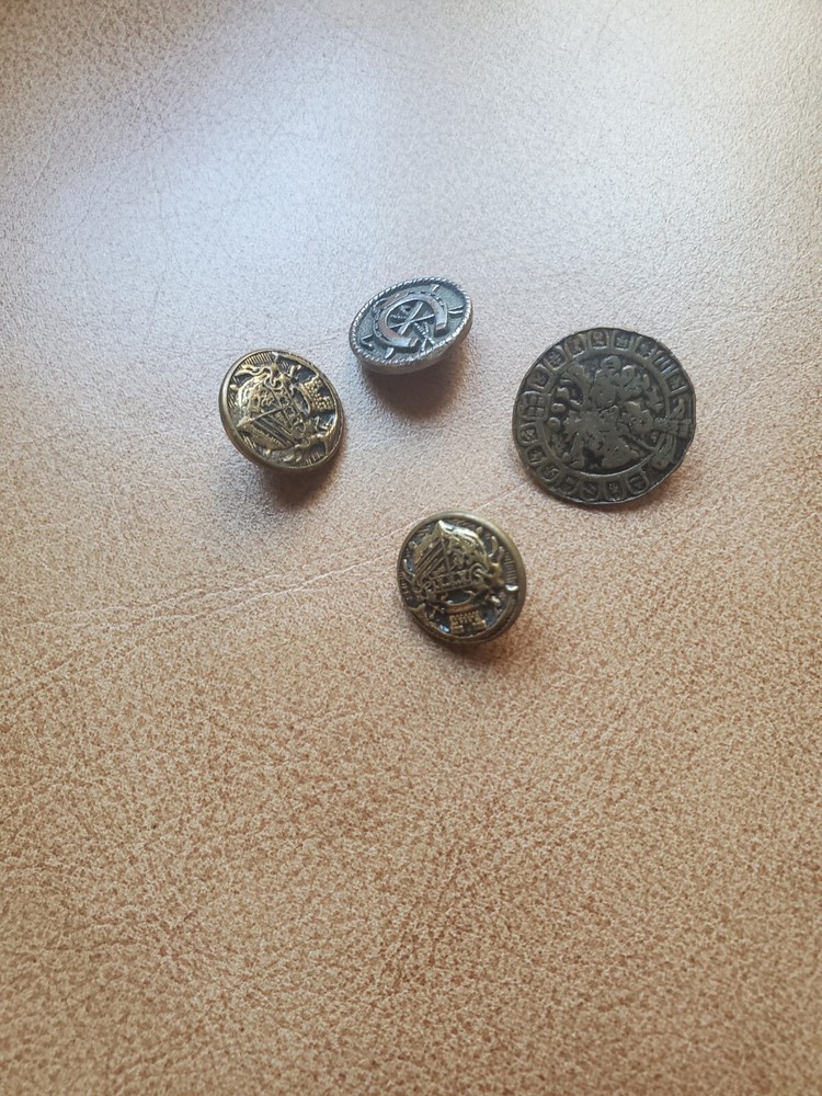 4 miscellaneous antique brass buttons