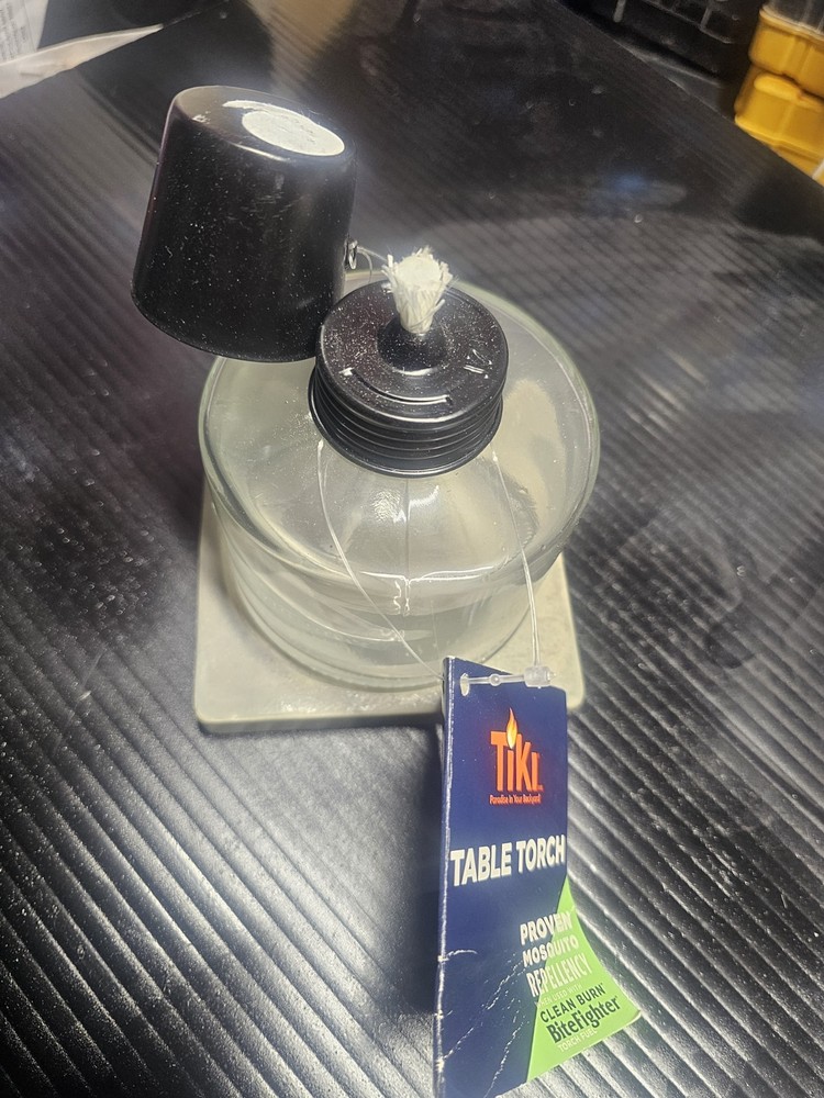 TIKI Mixed Material Tabletop Torch: Weather-Resistant, Smooth Finish, Refillable