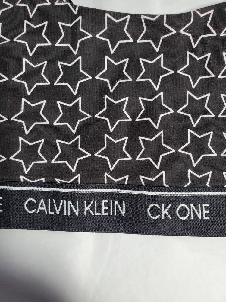 NWT Calvin Klein CK One Unlined Bralette Bra Black Star Pattern Medium
