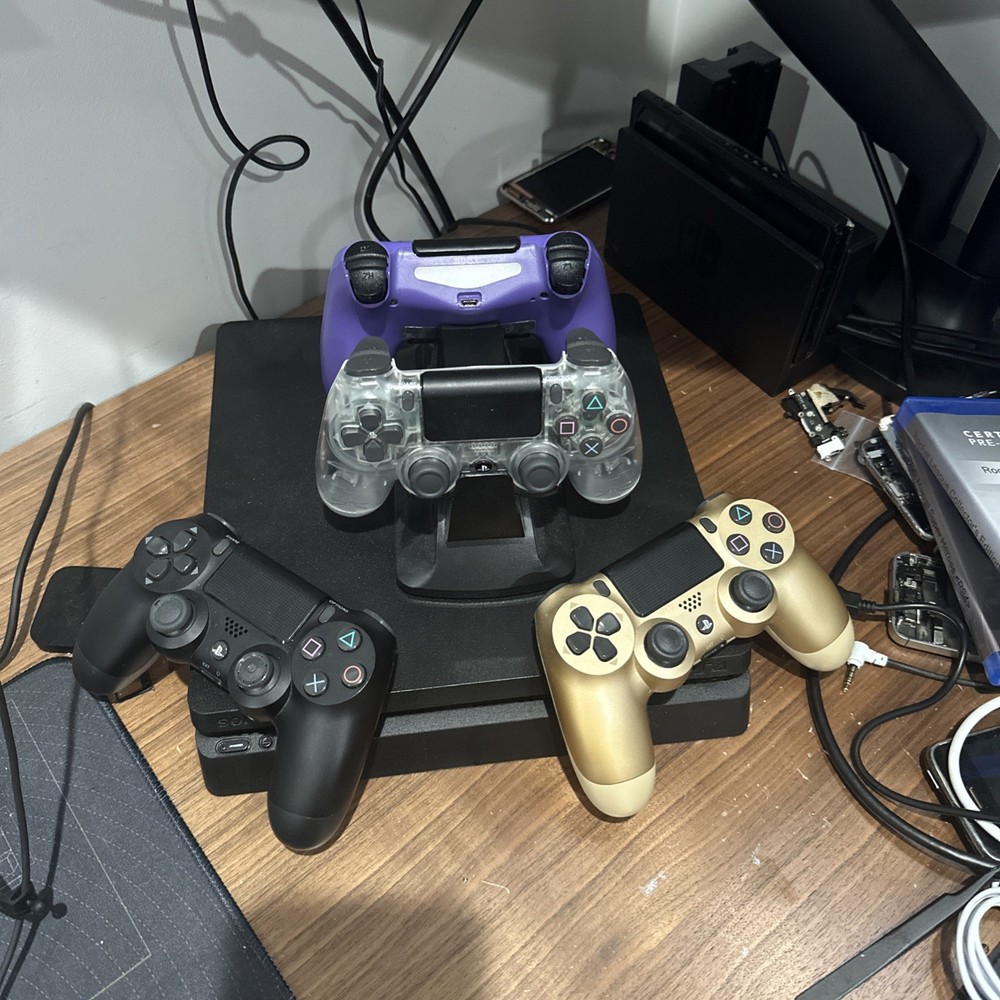 Playstation 4 Slim 2TB SSD + 4 Controllers & Charging Dock