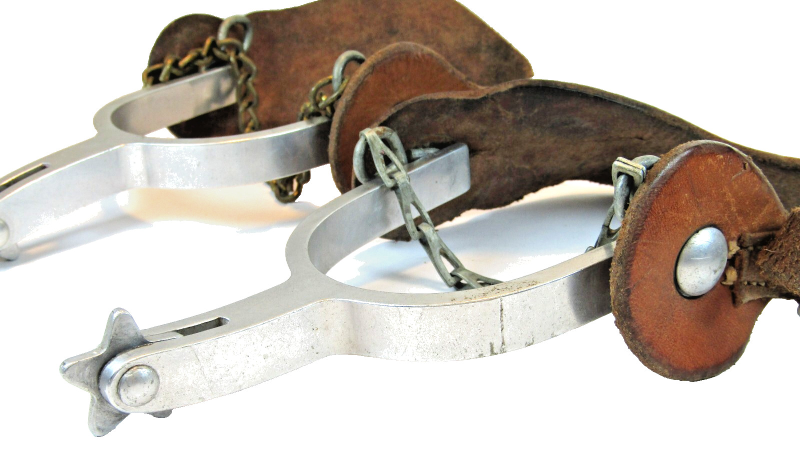 PAIR OF UNMARKED ENGRAVED ALUMINUM AIRPLANE METAL RIDING SPURS W/ STRAPS