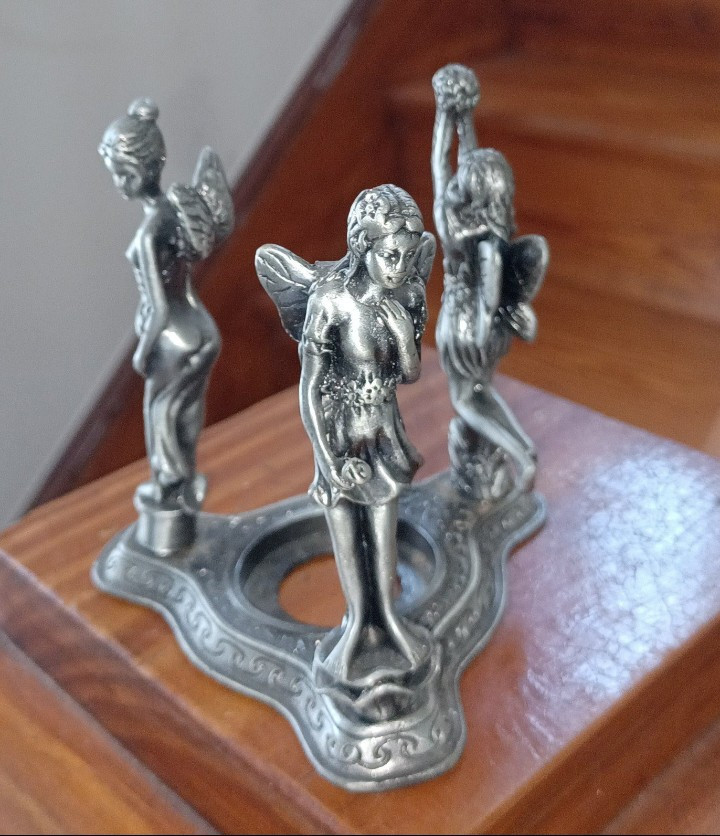 Metal 3 Character Pixie Tealight Holder.