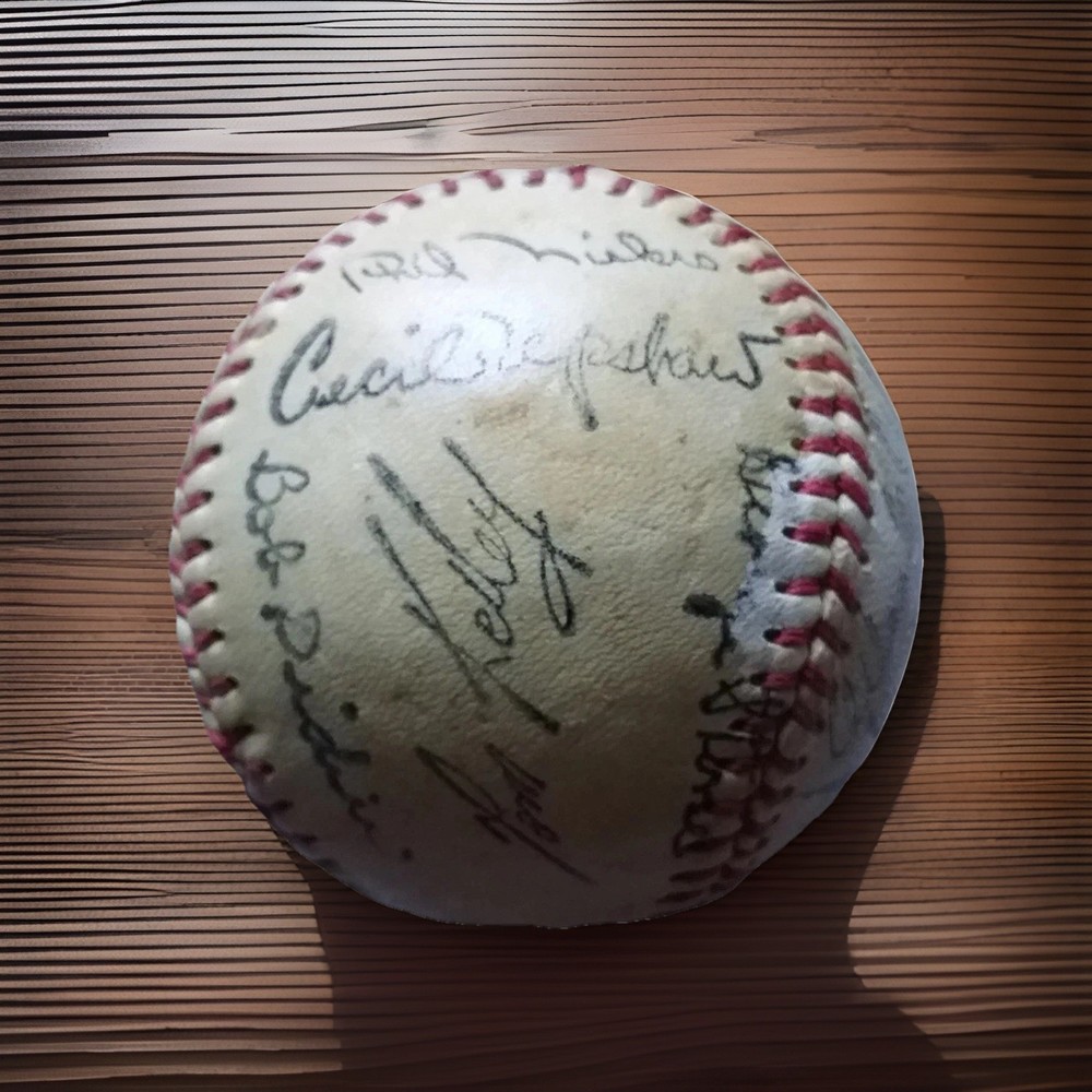 Signed Baseball /Henry Aaron + many players