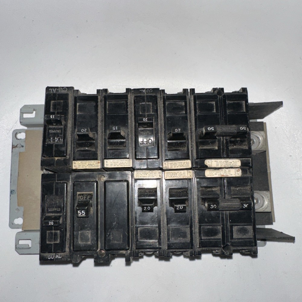 Electrical Load Center, service panel interior containing GE circuit breakers
