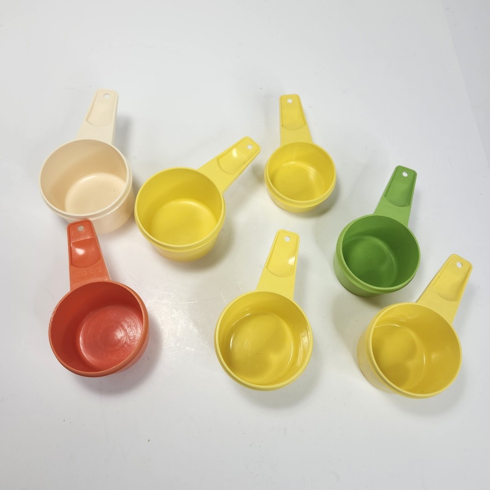Lot Of 7 Tupperware Measuring Cups Random Duplicate Sizes
