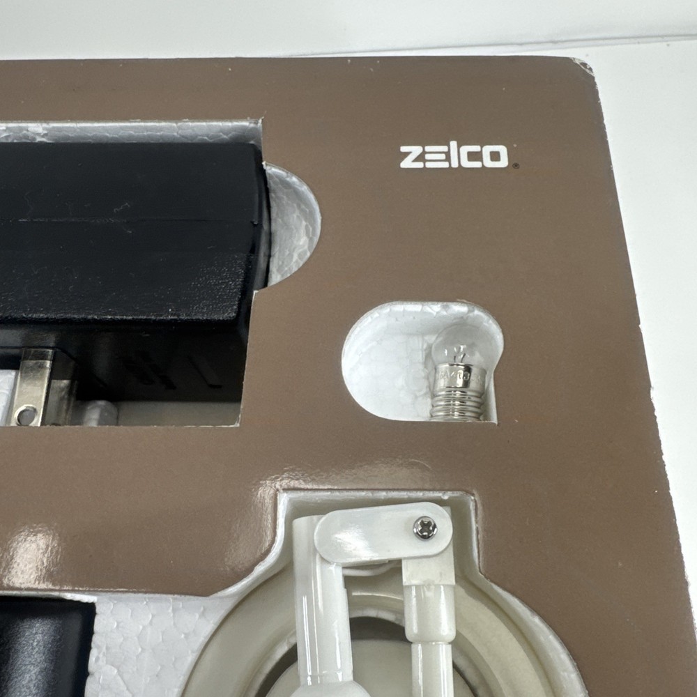 Zelco The Itty Bitty Book Light Original Reading Lamp