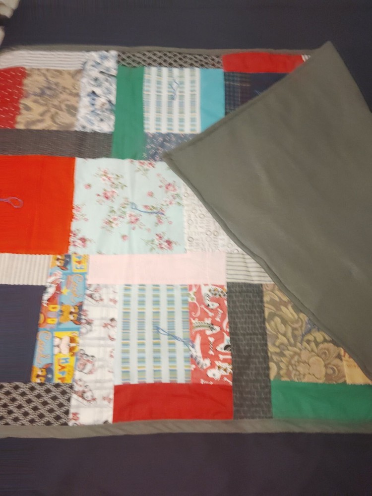 quilt/throw handmade 66 1/2 Length 41 1/2 Width