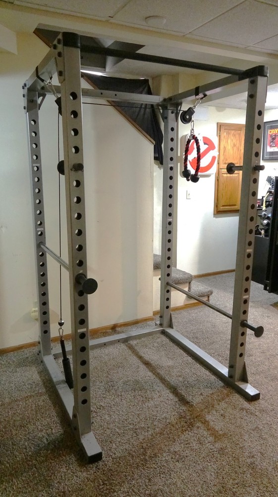 Body Solid power rack with pulley system for lifting weights - used