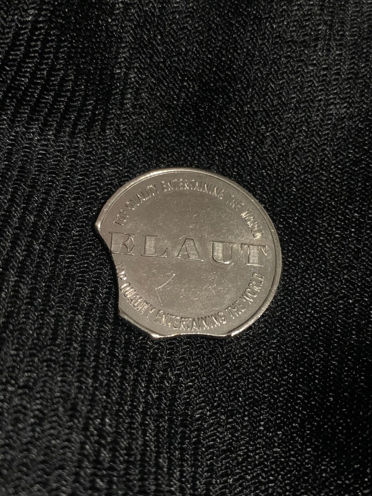 Elaut Error Token. Double Curved Clipped Planchet Error. RARE!