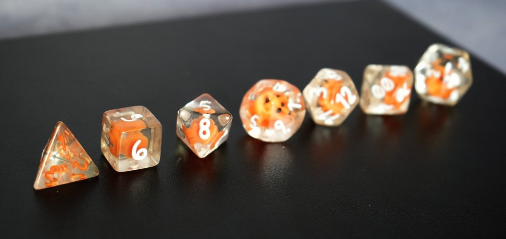 7 clear pumpkin acrylic dice set