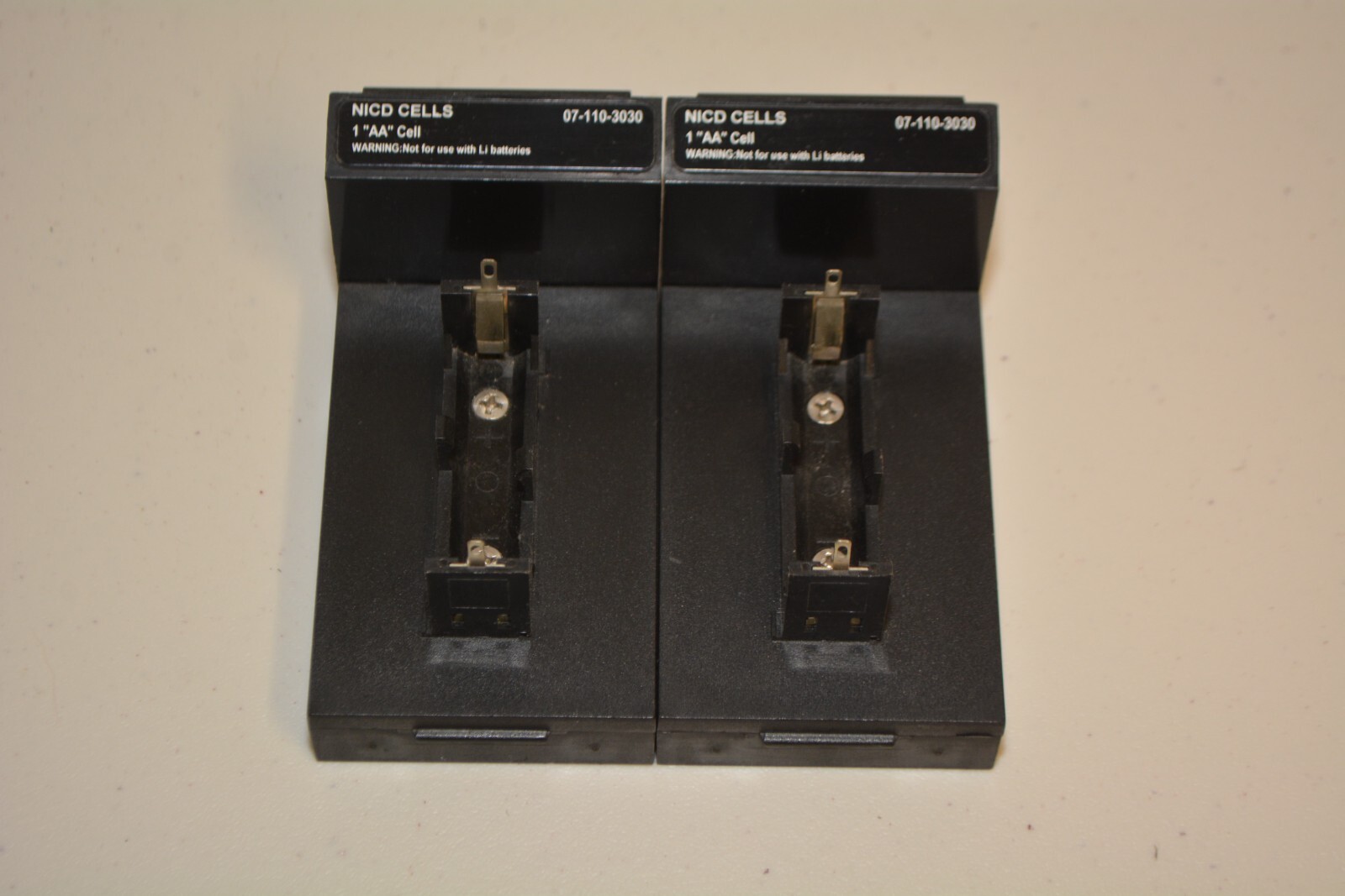 ^ Lot 2x Cadex Battery Adapter 1 "AA" Cell NICD Cells P/N: 07-111-3030 #W5726