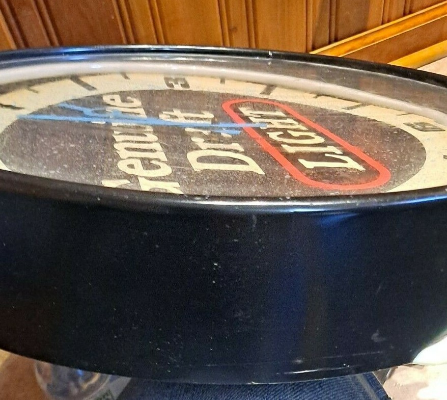 Genuine Draft Light Beer Neon Clock