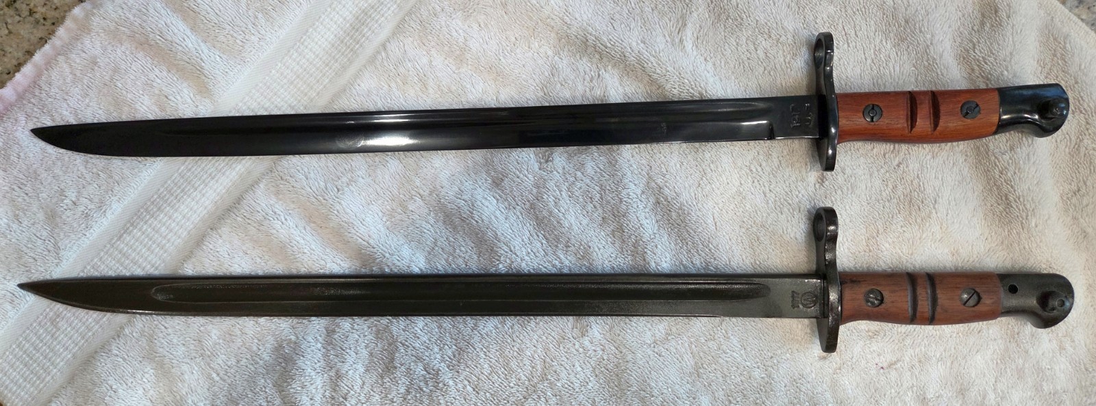 Real U.S. WWI Winchester Built M1917 Enfield Bayonet and a Repro also