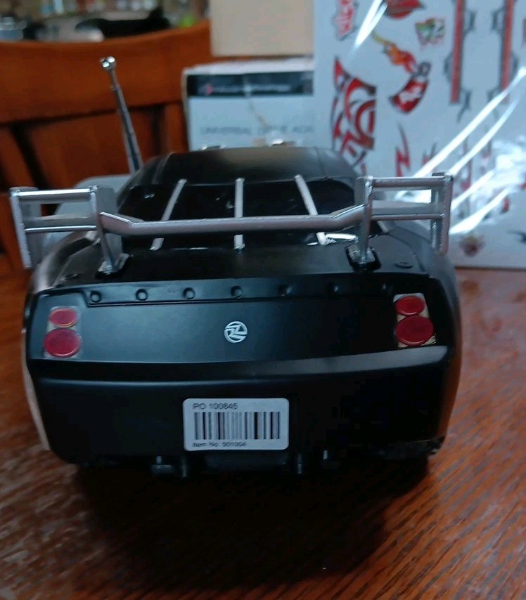 Ridemakerz RC Car, Remote, Hex Wrench Tool, Decals. Works