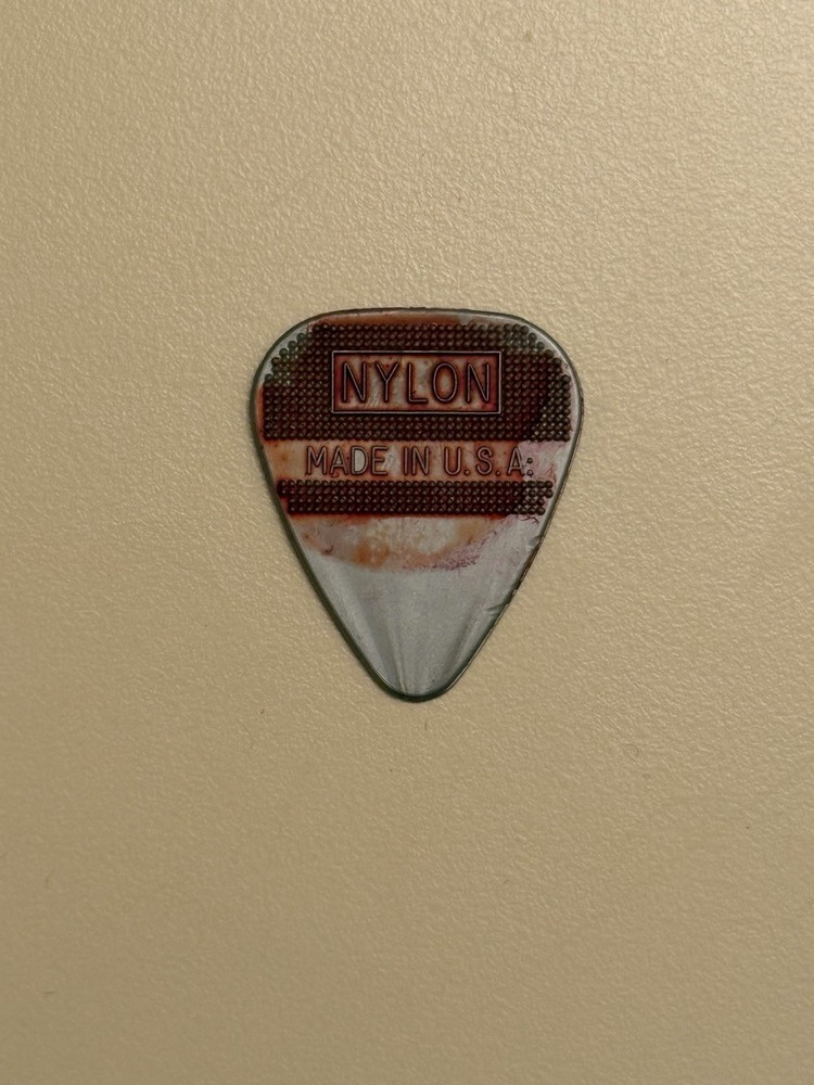 KISS 1996 Guitar Pick GENE SIMMONS Blood Stained Bass Solo Stage Used Plectrum