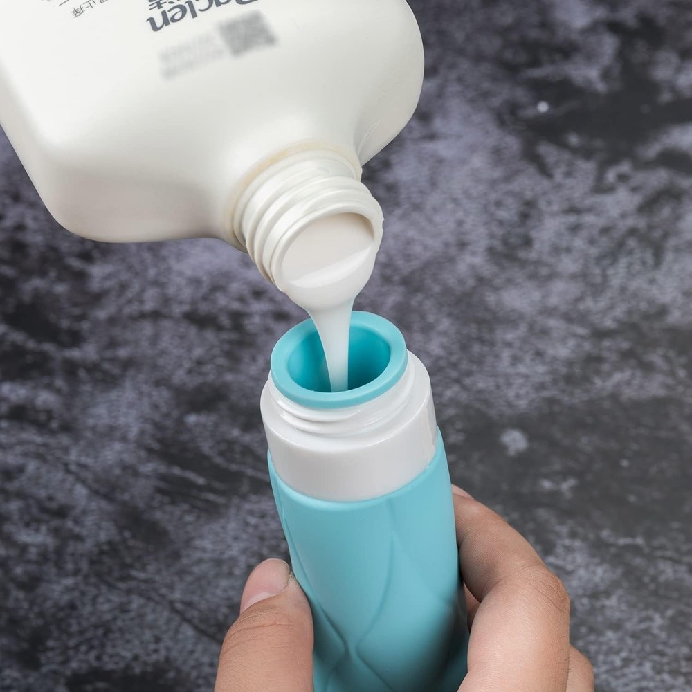 Compact Travel Essential: 4 Silicone Bottles, Leak Proof & TSA Friendly (60ml)