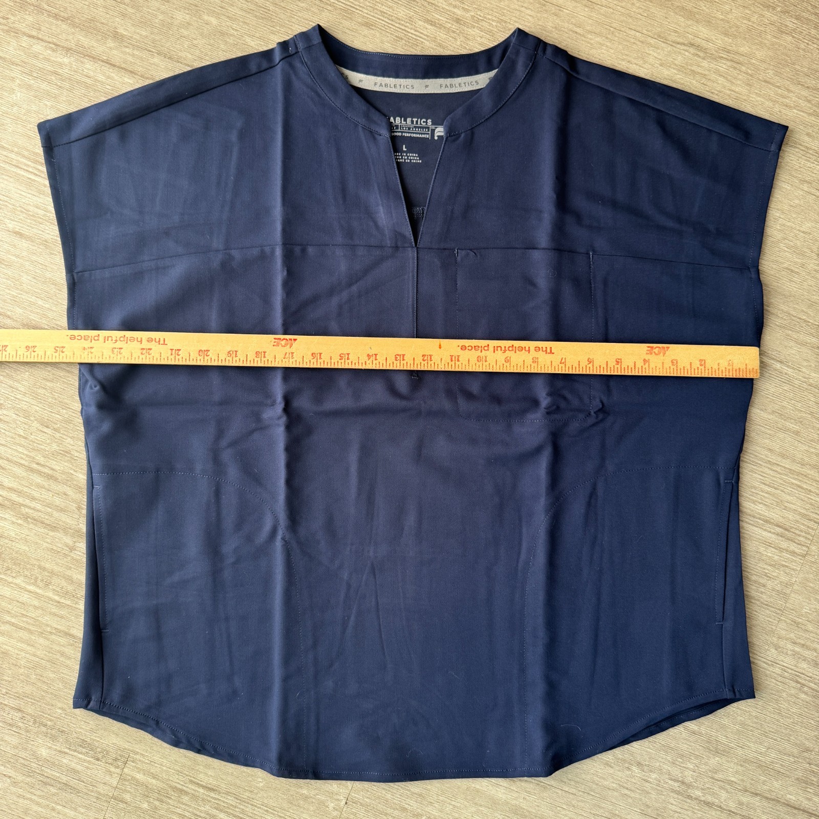 Fabletics Evolve Scrub Top Womens Large NWT Navy Blue 3 Pocket Oversized Stretch