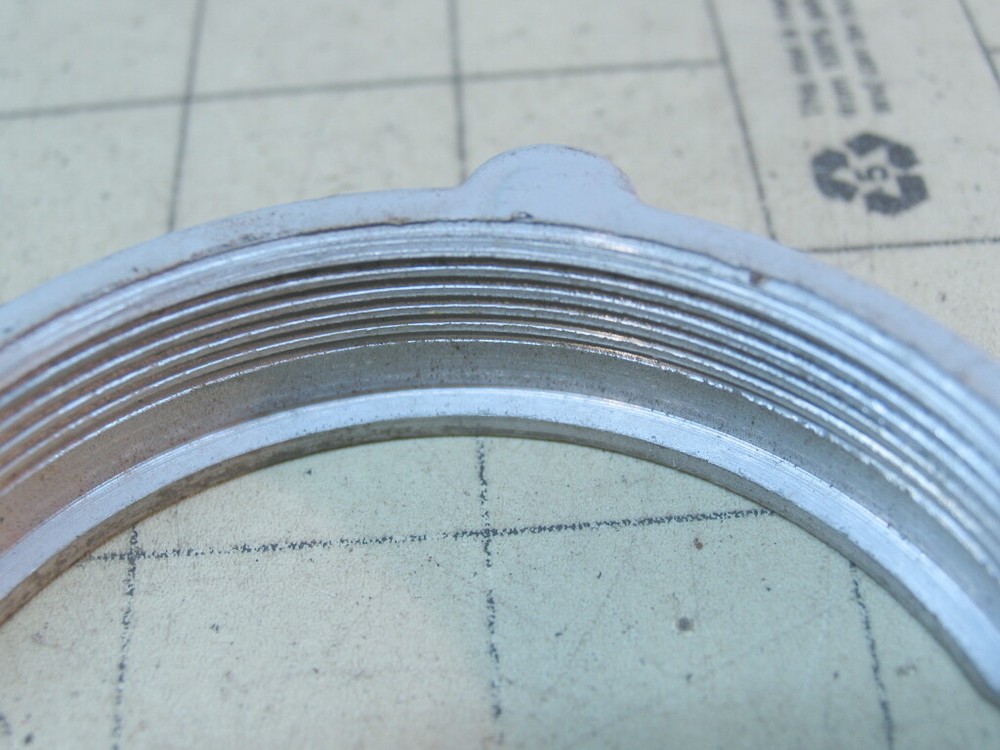 One Electrical device threaded Rings 2-1/4" dia.
