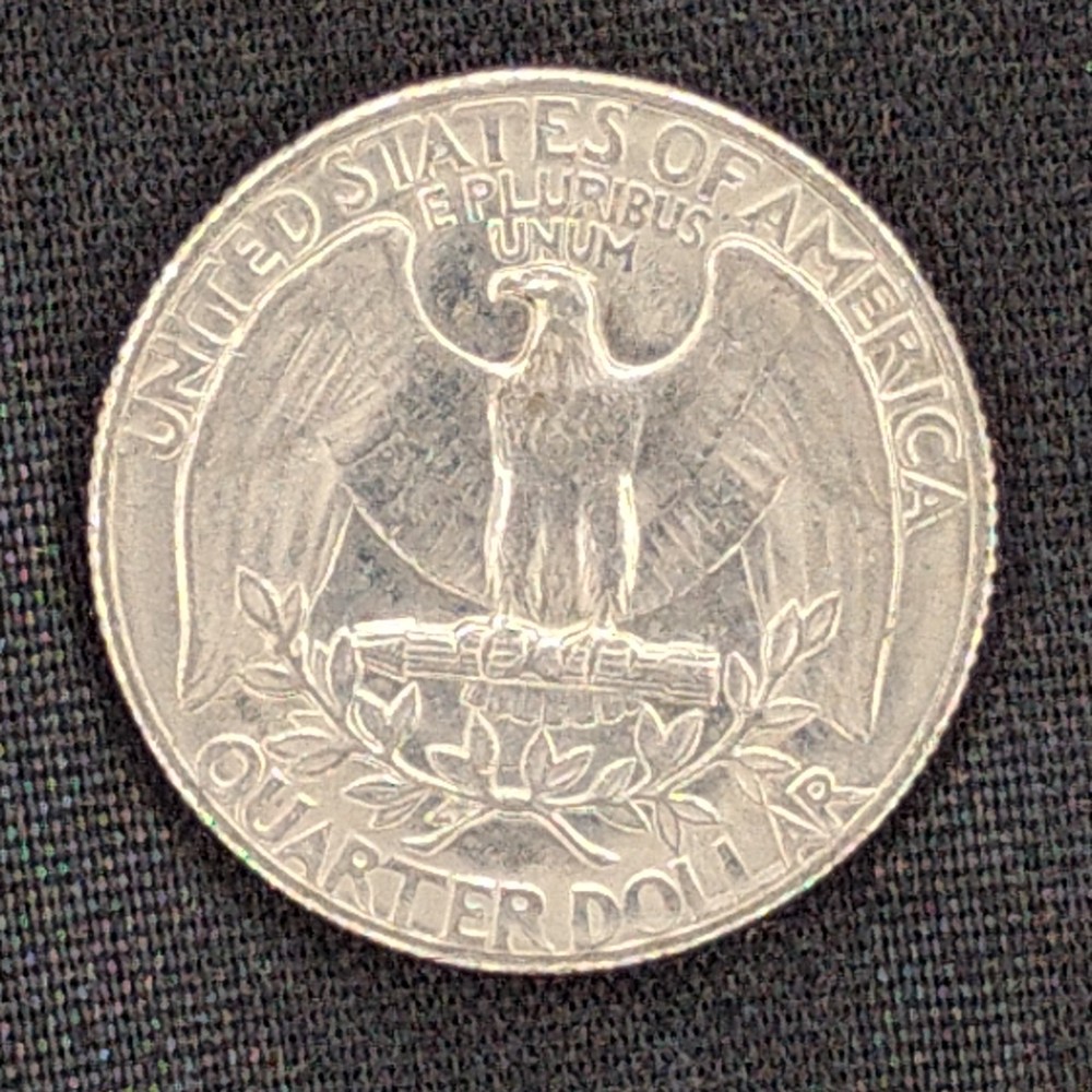 1973 Washington Clad Quarter Double Edge Error Obverse