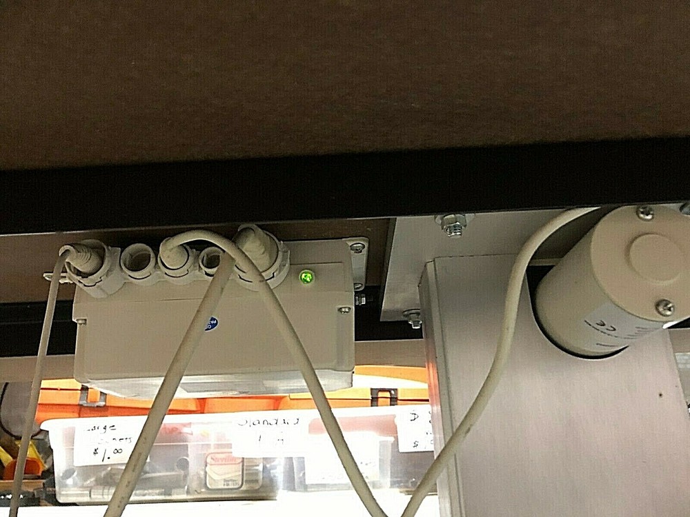 Huasmann electronic elevating table 4375 work surface adjustable 27” to 43” high