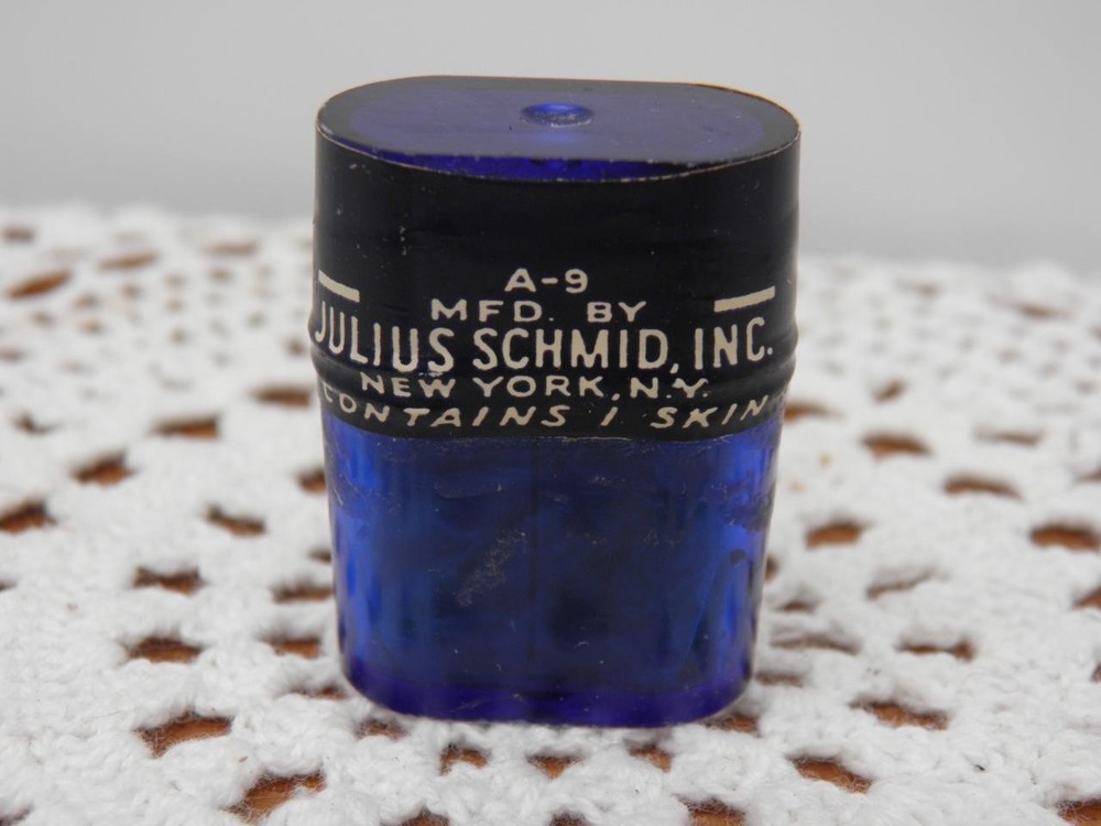 VINTAGE FOUR X CONDOMS IN TINY PLASTIC CAN