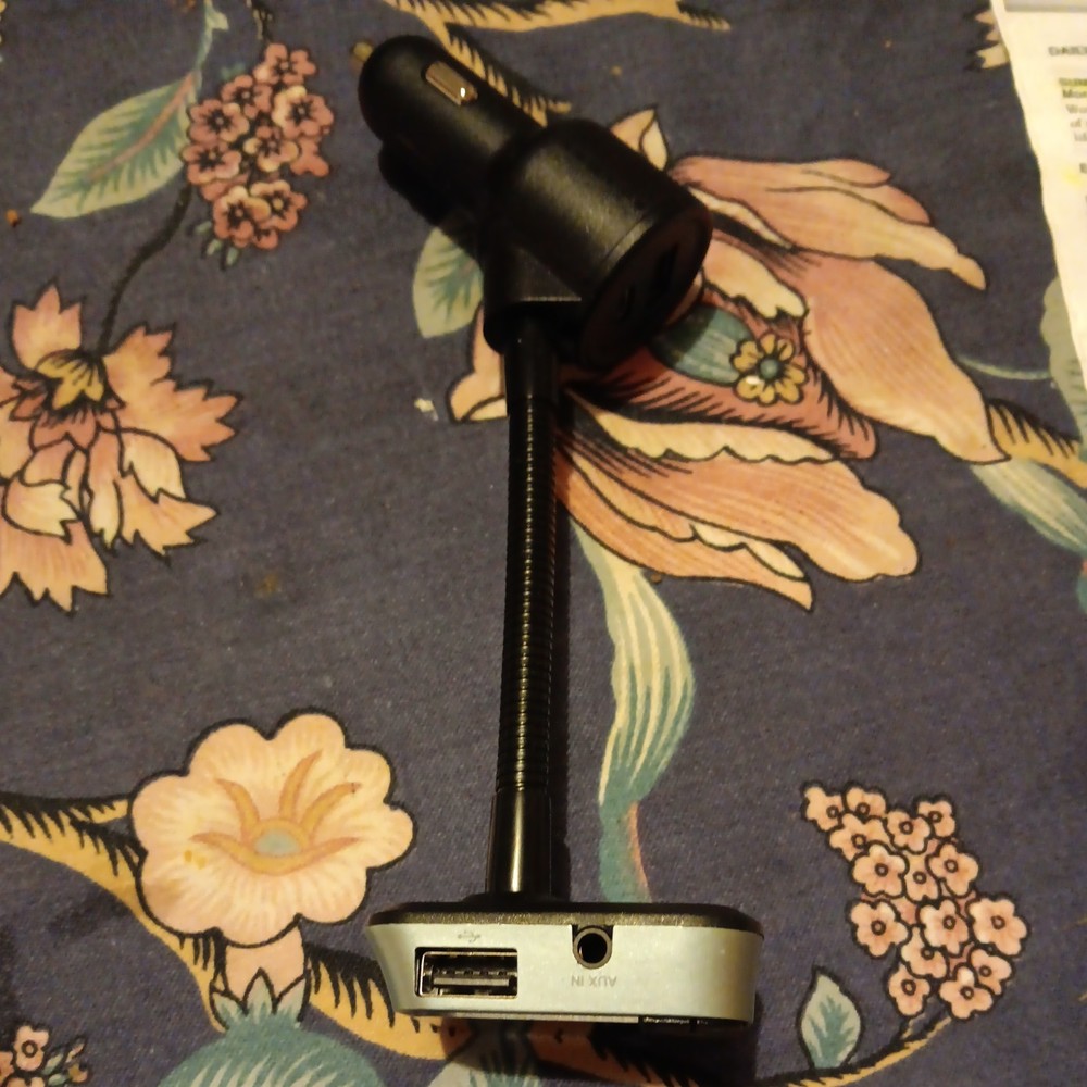 Auto Drive Gooseneck Bluetooth FM Transmitter with dual usb charging ports.