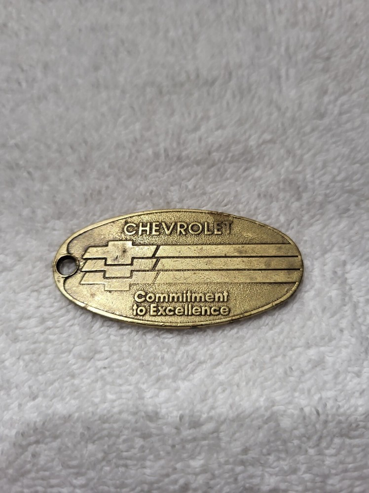 Vtg Chevrolet Commitment to Excellence Brass Key Chain 2"