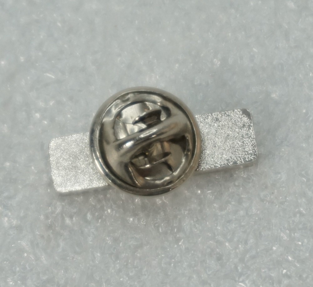 Lapel\Hat Pin Benelli Silver Toned Background Red Letters