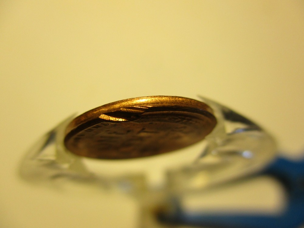 1953-D Mint State Wheat Cent-Edge Peel Partial Collar