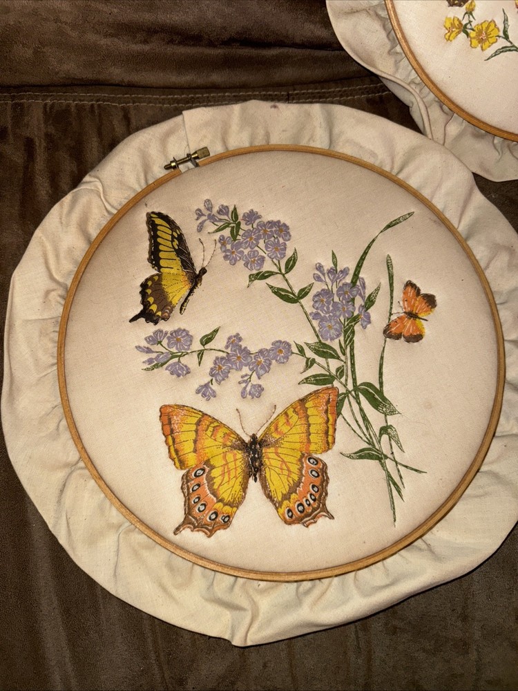 Three Embroidery Hoops With Finished Pieces