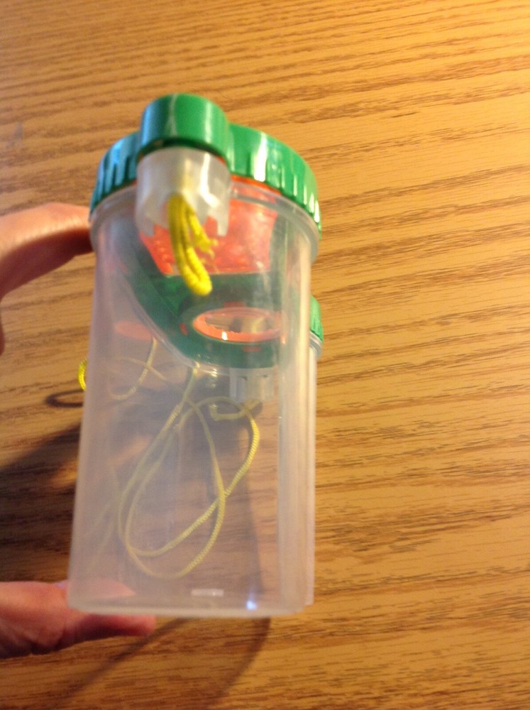 green orange and clear bug habitat