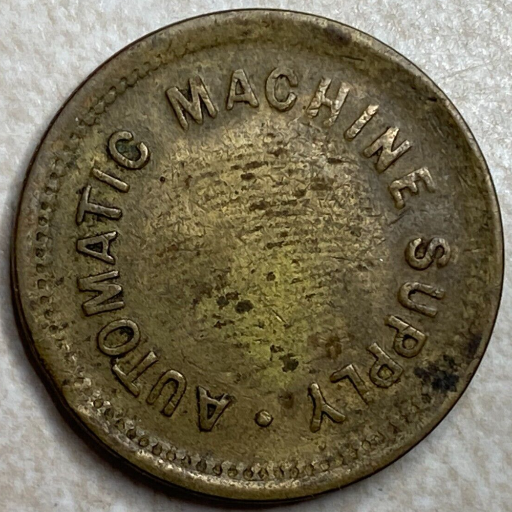 The Automatic Machine Supply Co Brighton UK E Mann Vending Trade Token T2152
