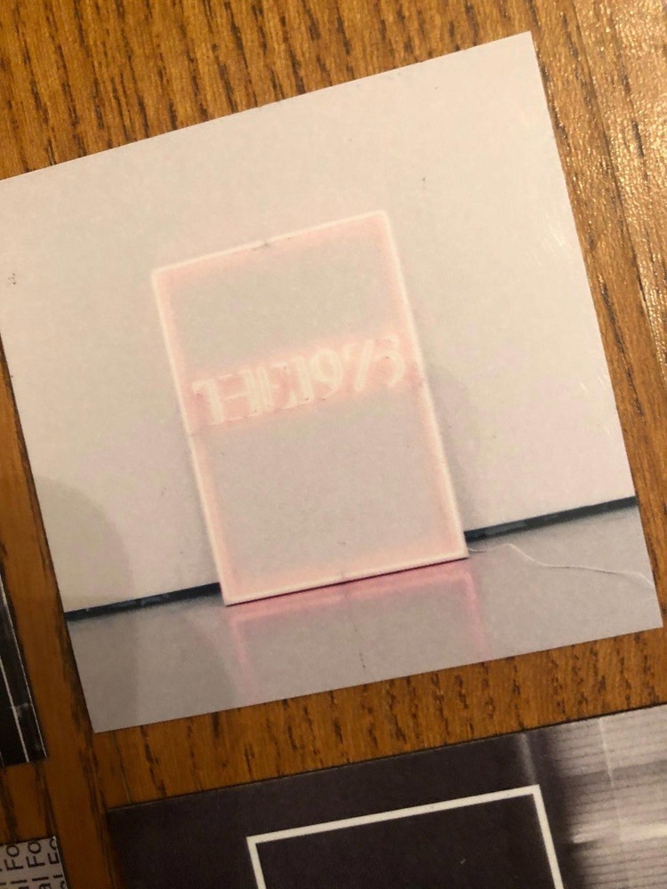 The 1975 fridge magnets