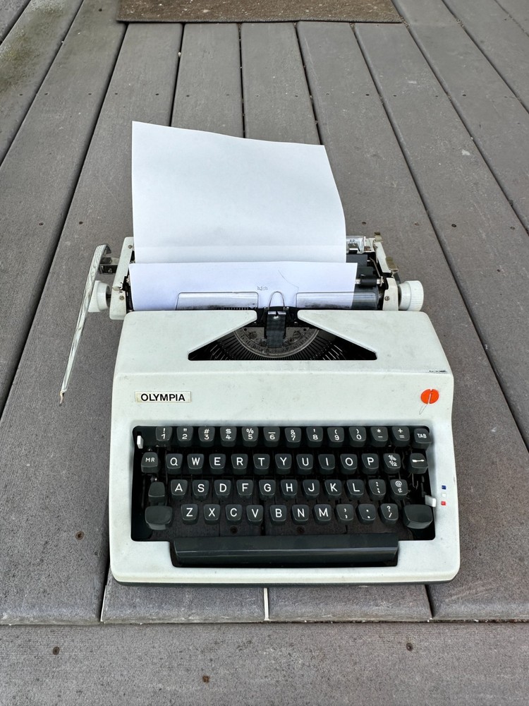 Olympia SM9 Portable Typewriter with case