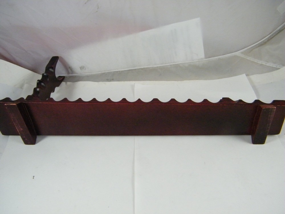 ORNATE PLASTIC SAMURAI SWORD WITH FOO DOG HANDLE AND STAND