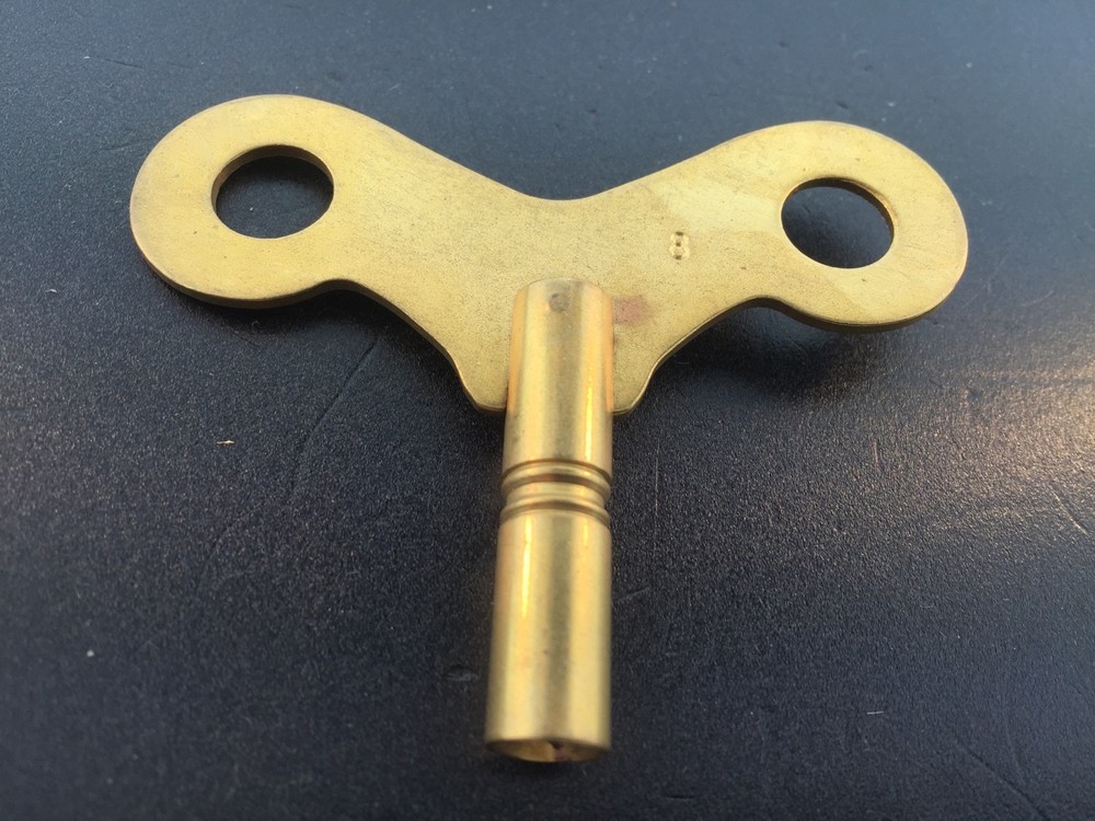 Solid Brass Wide Wing Clock Key.  # 8 or 4 mm. or .165 inches