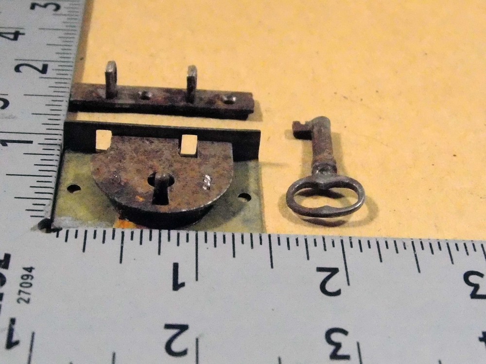 Antique miniature chest lock.
