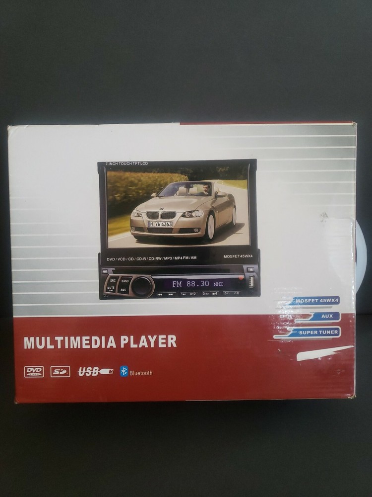 Auto multimedia player. New open box. 7" touch screen. See description