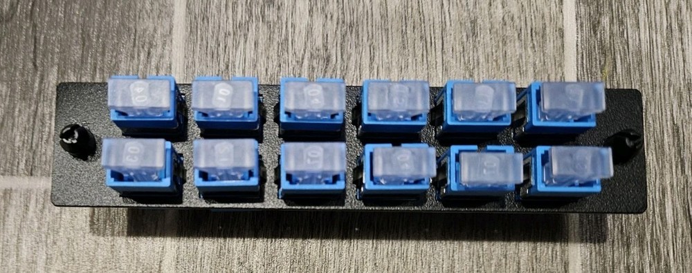 Loaded LGX Adapter Panel with 12x Simplex SC/UPC Singlemode - Black