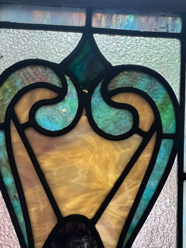 Interesting small stained glass window