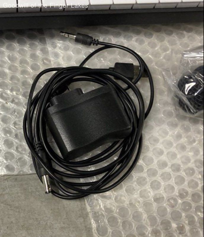 Unbranded 61Keys Electronic Keyboard Powers ON