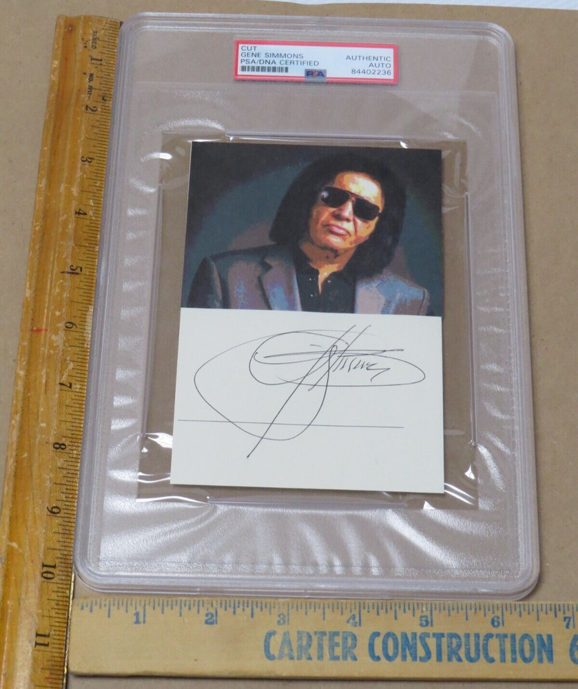 KISS GENE SIMMONS CUT AUTOGRAPH AUTHENTICATED & SLABBED BY PSA