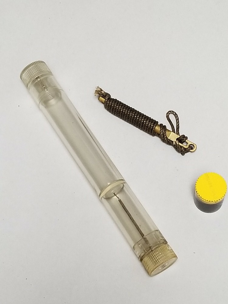M1 GARAND PLASTIC OILIER WITH PULL THROUGH AND GREASE POT.