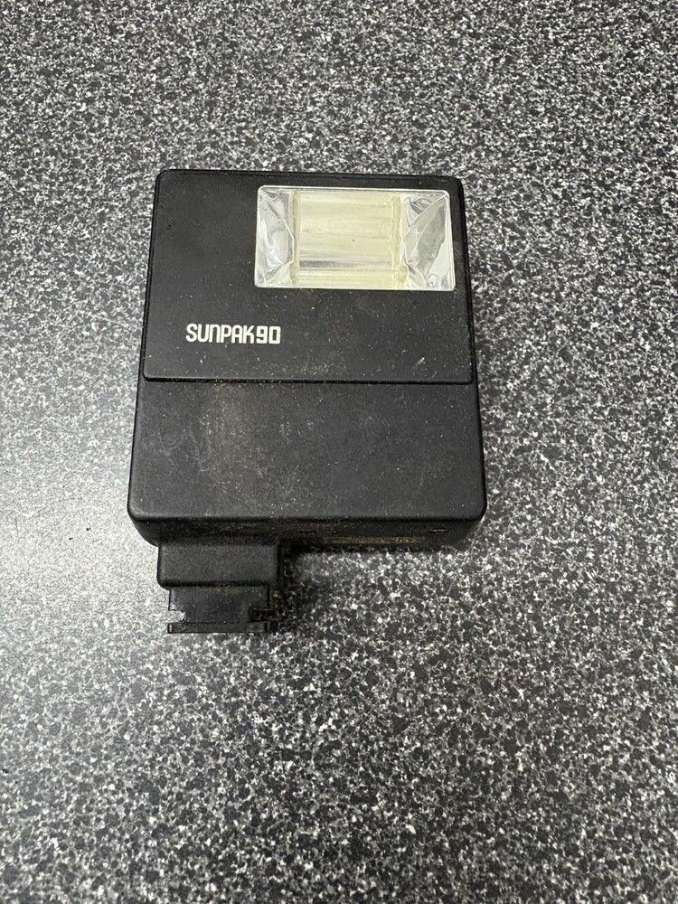 Sunpak 90 Basic Electronic Flash Used On A Canon AE 1 Not Tested