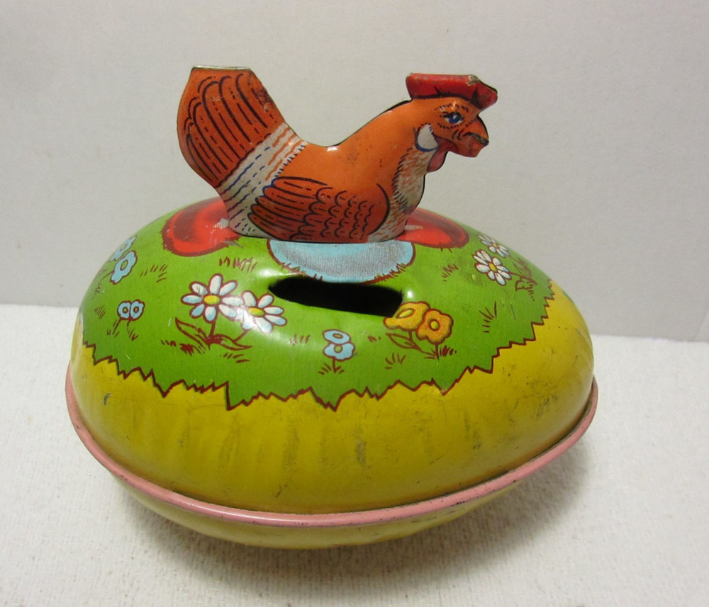 CHEIN TIN NESTING HEN ON EASTER EGG CONTAINER /MADE INTO BANK - DOESN'T OPEN