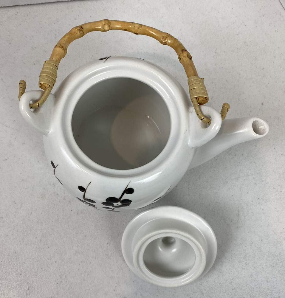 White Ceramic Teapot w Black Flowers & Two Cups Wicker Handle EUC
