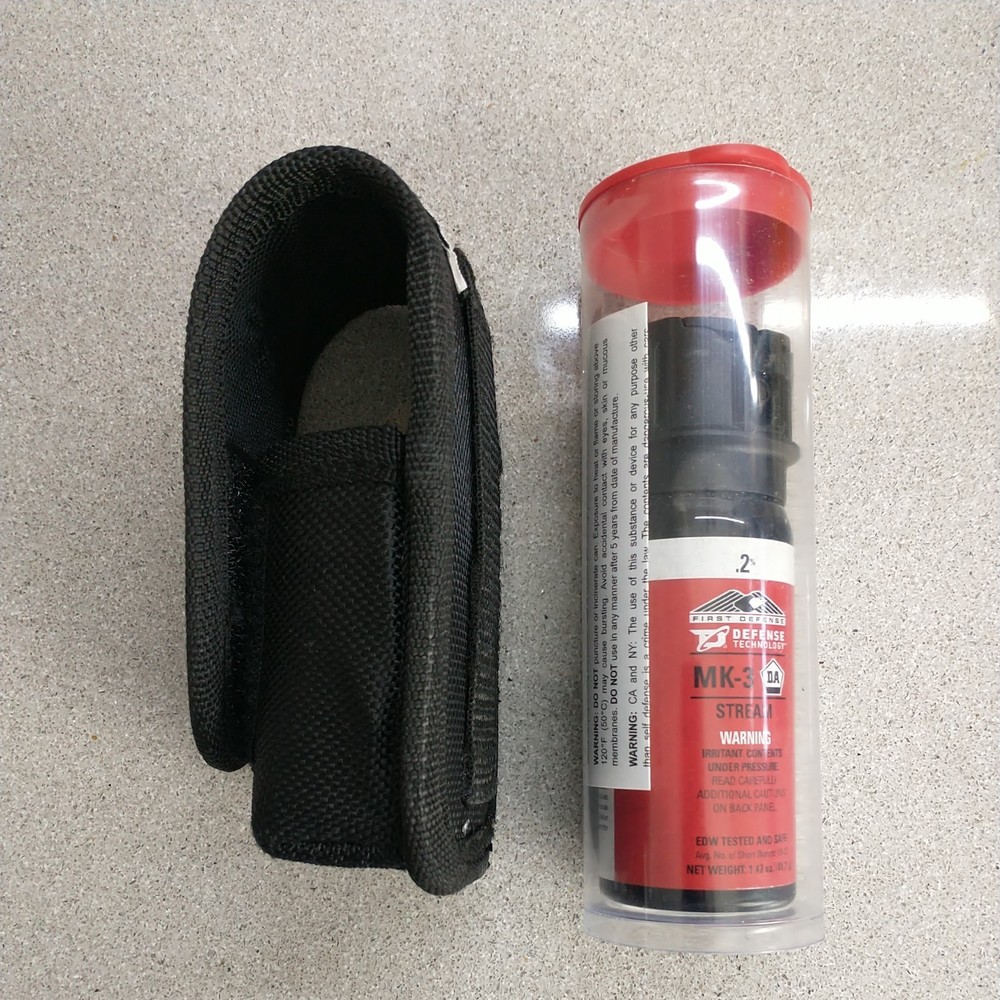 One (1) Defense Technology OC Stream MK-3 .2% Solution w/ Ballistic Nylon Holder