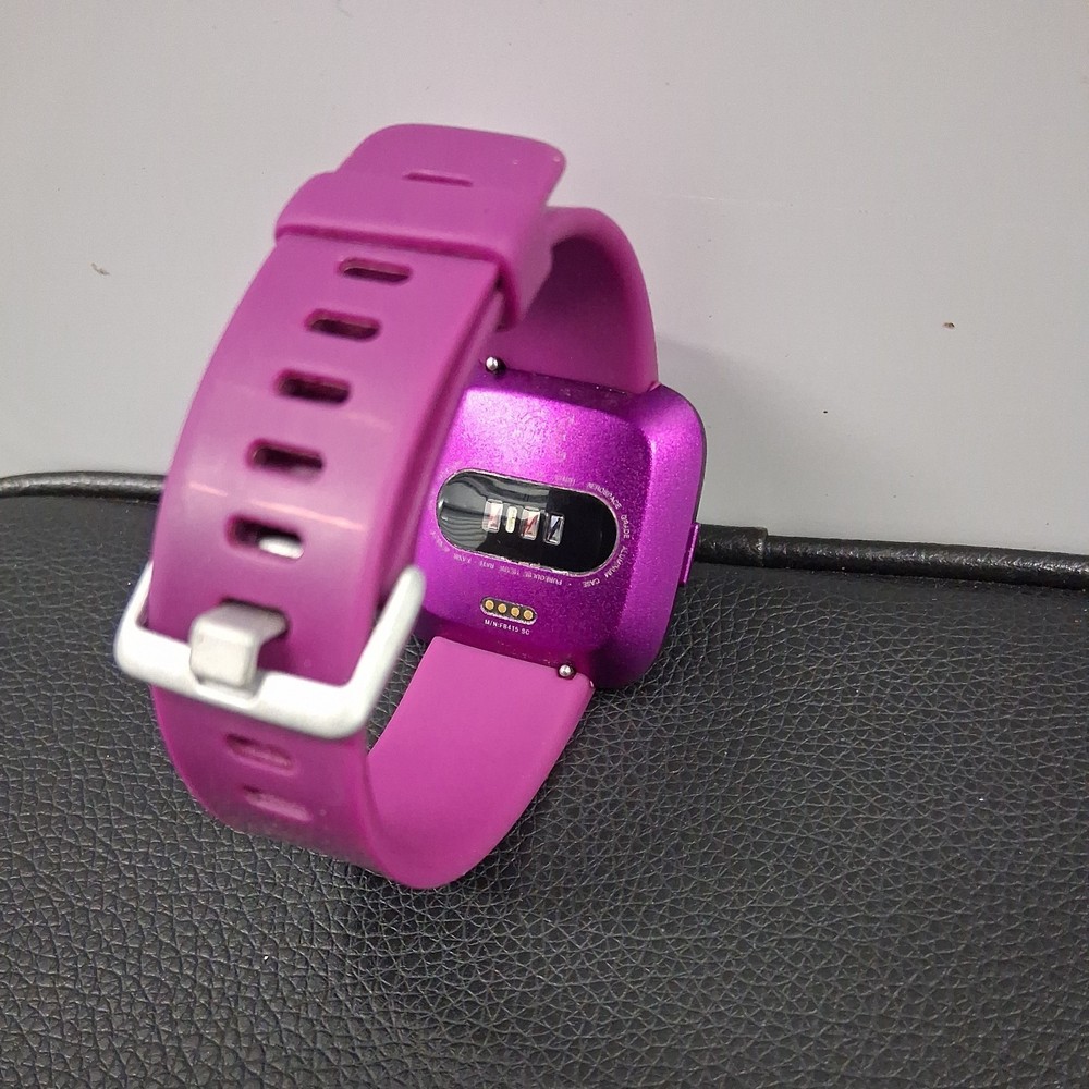 Fitbit Light FB415 Purple W/ Charging Cable good condition