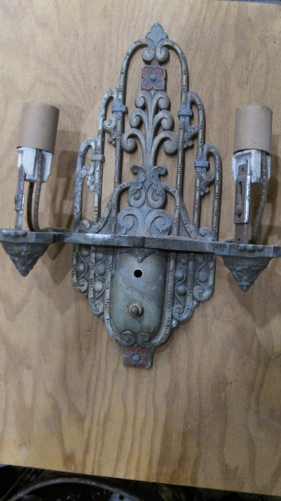 Vintage Lighting Seven sconces by Riddle!