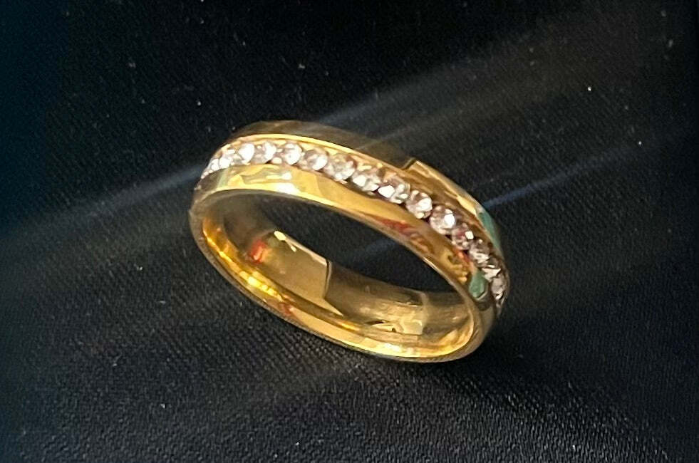 Gold band with infinite stone